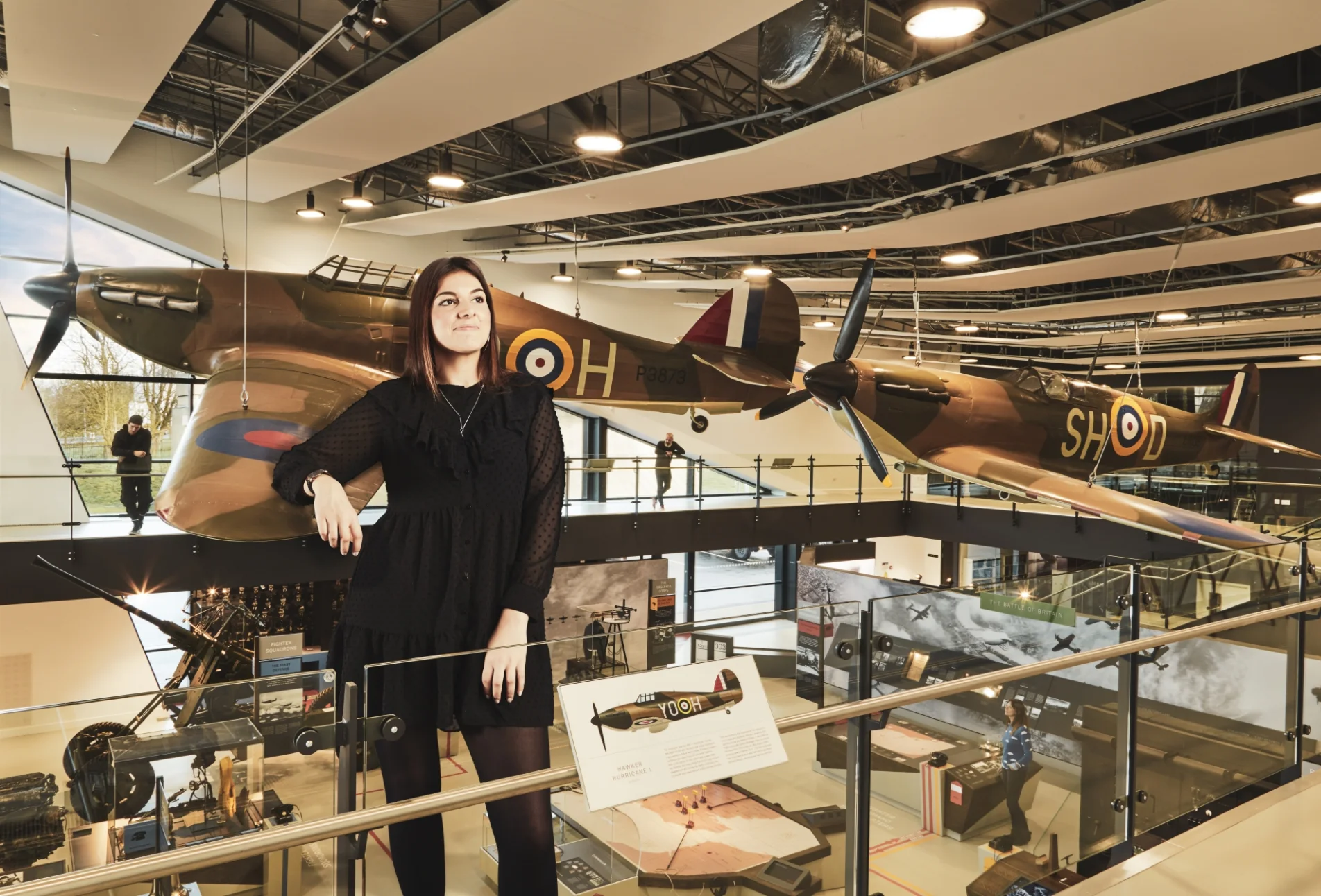 Giant woman leaning on old jets - hillingdon