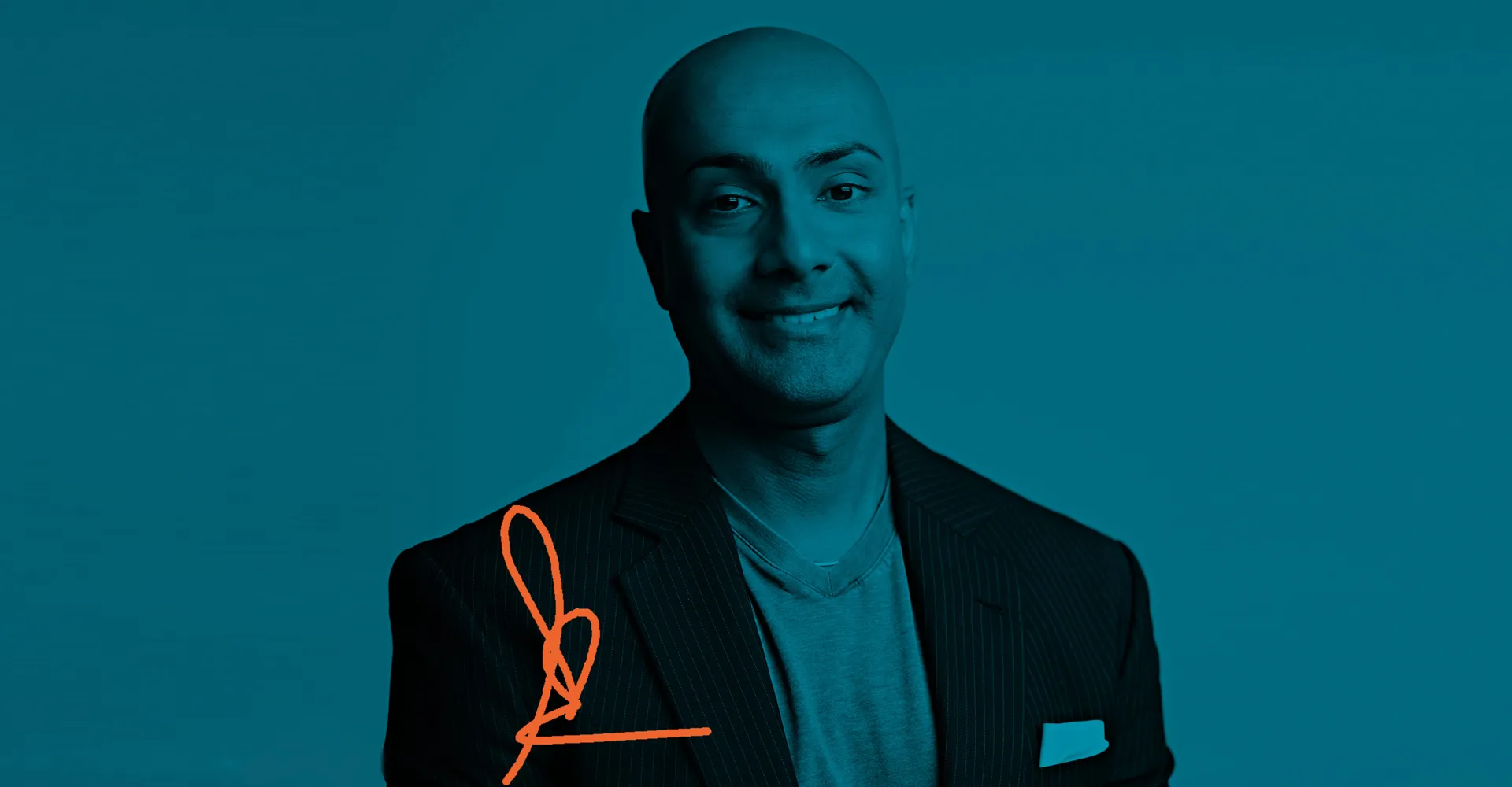 Ofcom Employee portrait. Sachin grins toothily