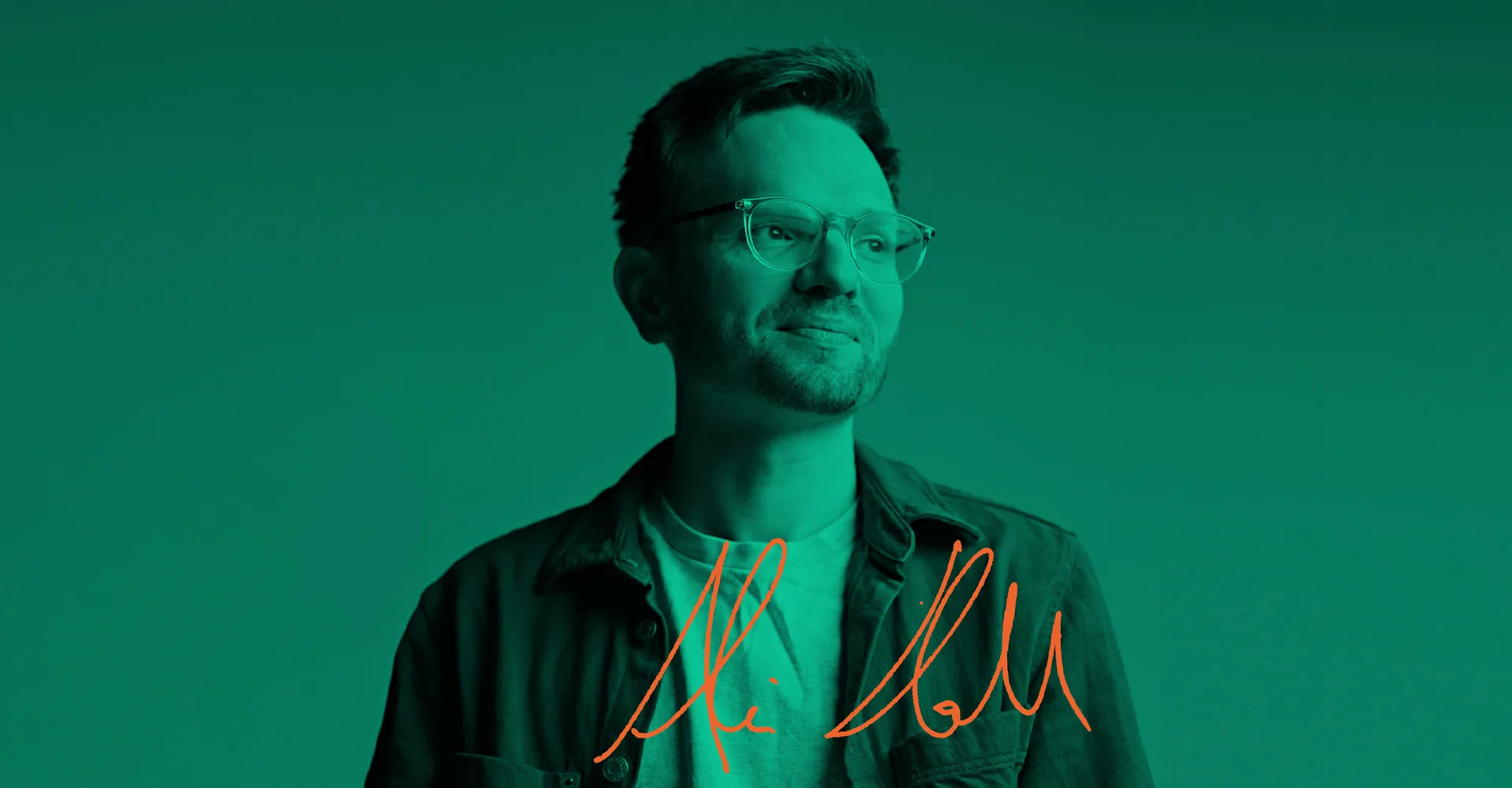 Ofcom Employee portrait. Ali glances thoughtfully into the distance