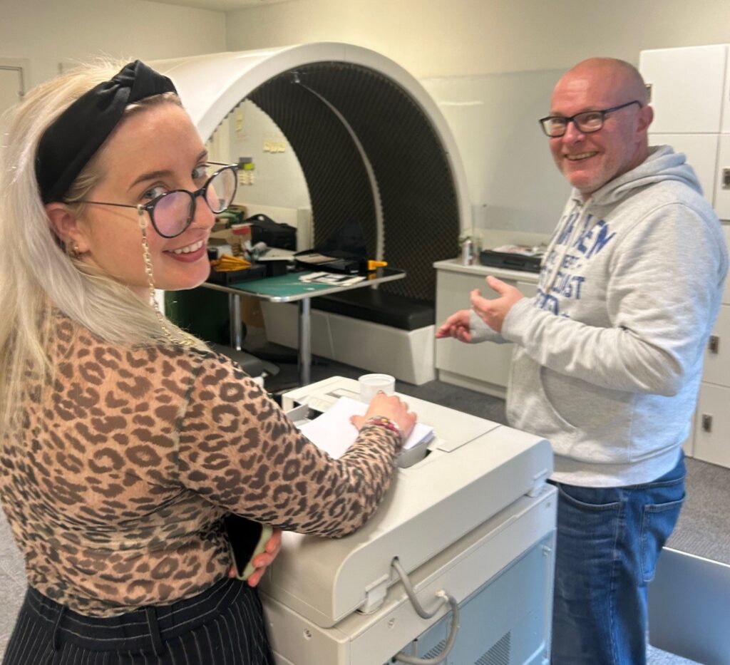 Rachel and Dave at the printer
