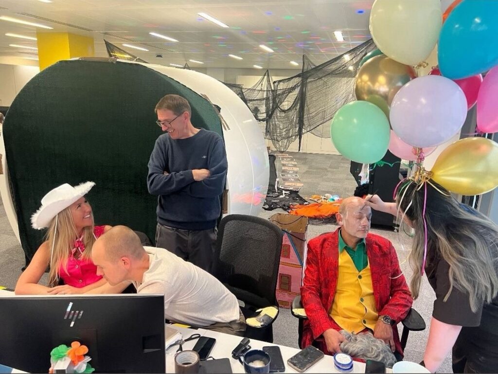 Office workers in fancy dress for Halloween